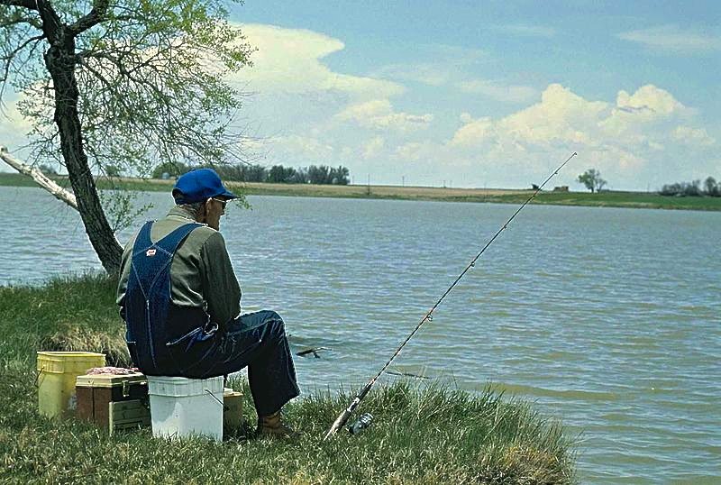 Old_man_fishing_US_Fish_and_Wildlife_Service