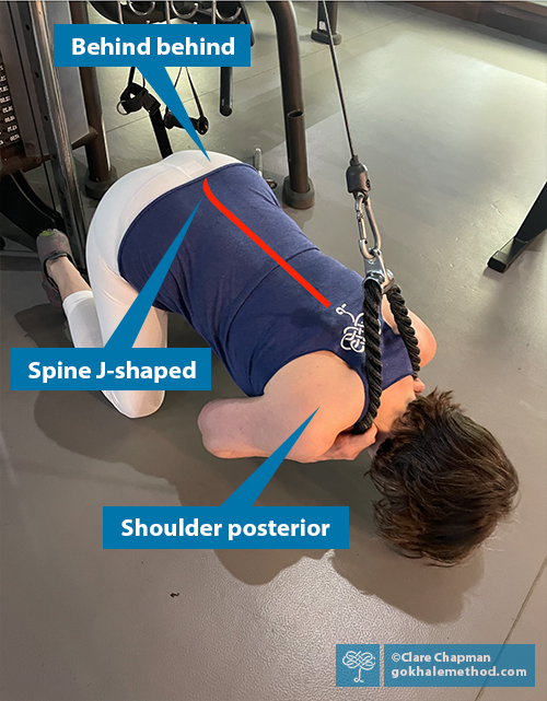 Gokhale Method teacher Julie Johnson does a pull-down exercise with a J-spine.