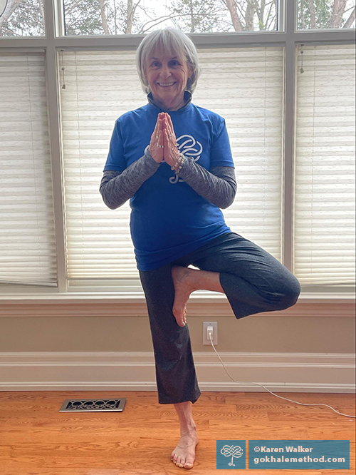 Gokhale Method teacher Karen Walker standing in tree pose.