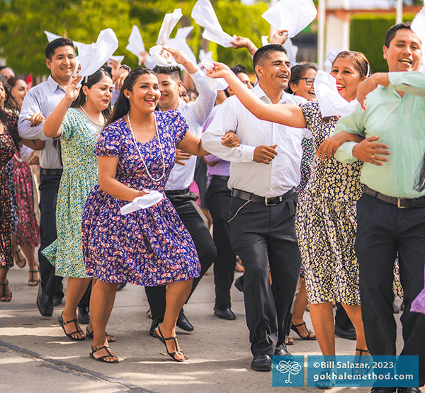 People dancing at a summer festival in Peru