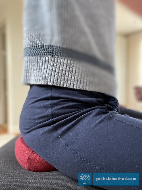 Close-up of stacksitting, sitting on the flat side of the Gokhale Wedge.