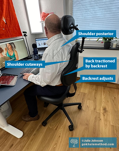 Photo of a man stretchsitting at a desk in a Gokhale Executive chair.