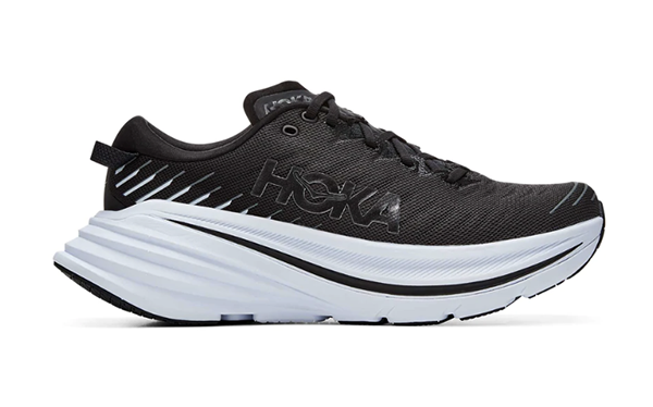 Highly padded modern road running shoe, black, white sole.