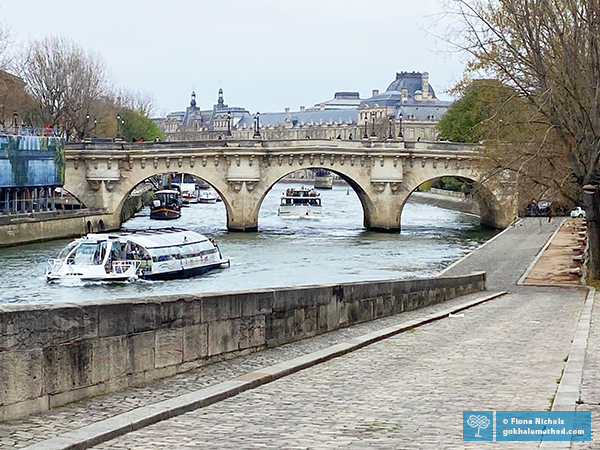 A view of a bridge spanning the river Seine in Paris, France.