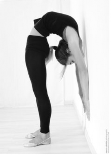 In Yoga: Bend Back, Don't Swayback!