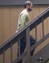 Eric Fernandez angles his body forward in line with his back leg as he walks up the steps.