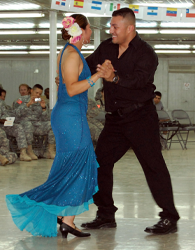 These Bachata dancers embody many of the healthy postural elements that we teach.