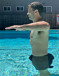 Gokhale Method teacher Eric Fernandez shows how engaging the inner corset makes the torso slender.