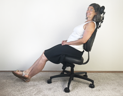 Esther Gokhale enjoying the reclining function of the new Gokhale® Executive Chair.
